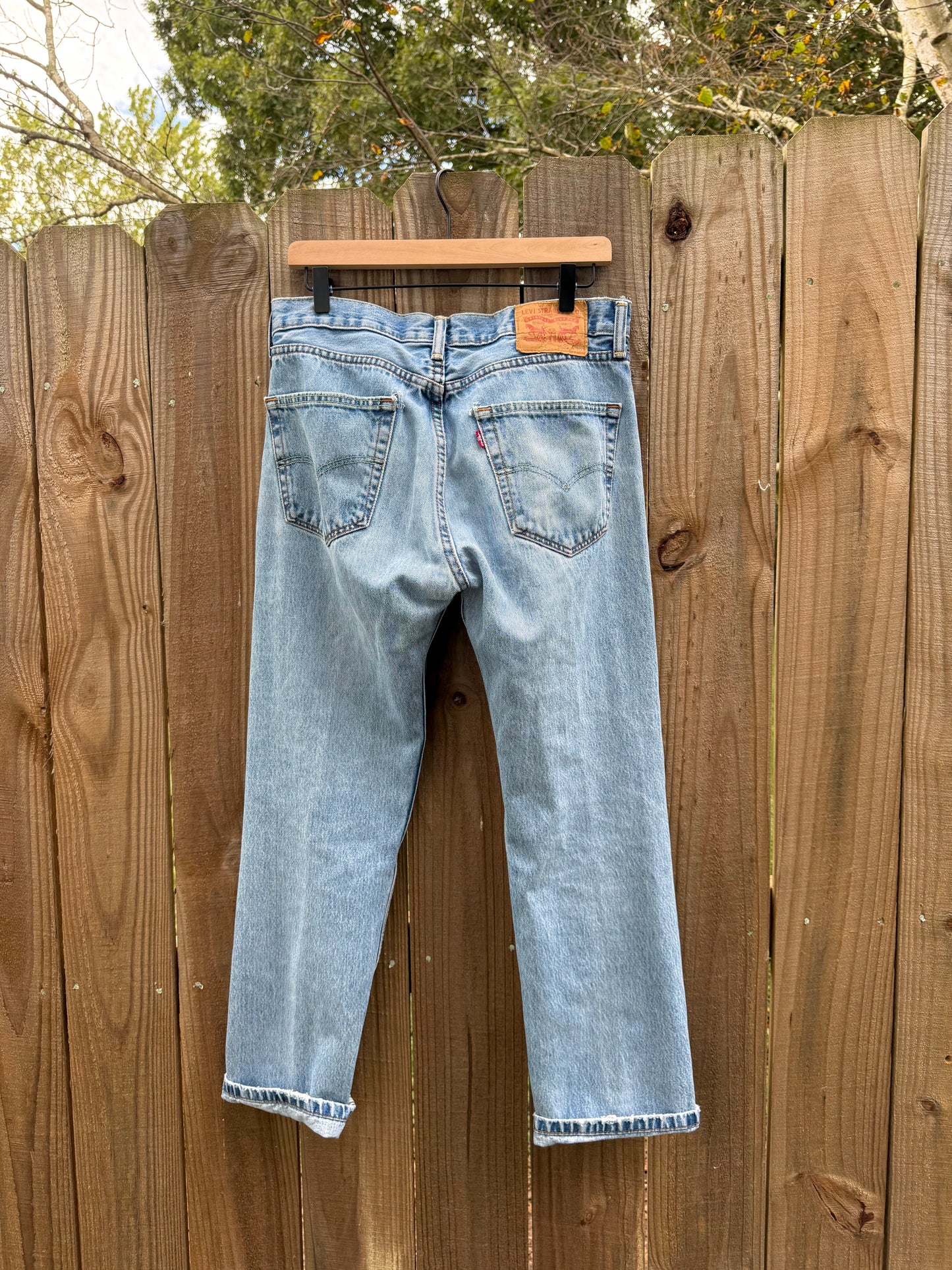 Vintage Levi’s 550 Relaxed Taper Jeans – Mid Wash, Made in USA